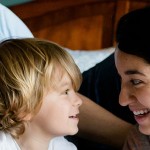 Healthy Family on Bed at Home